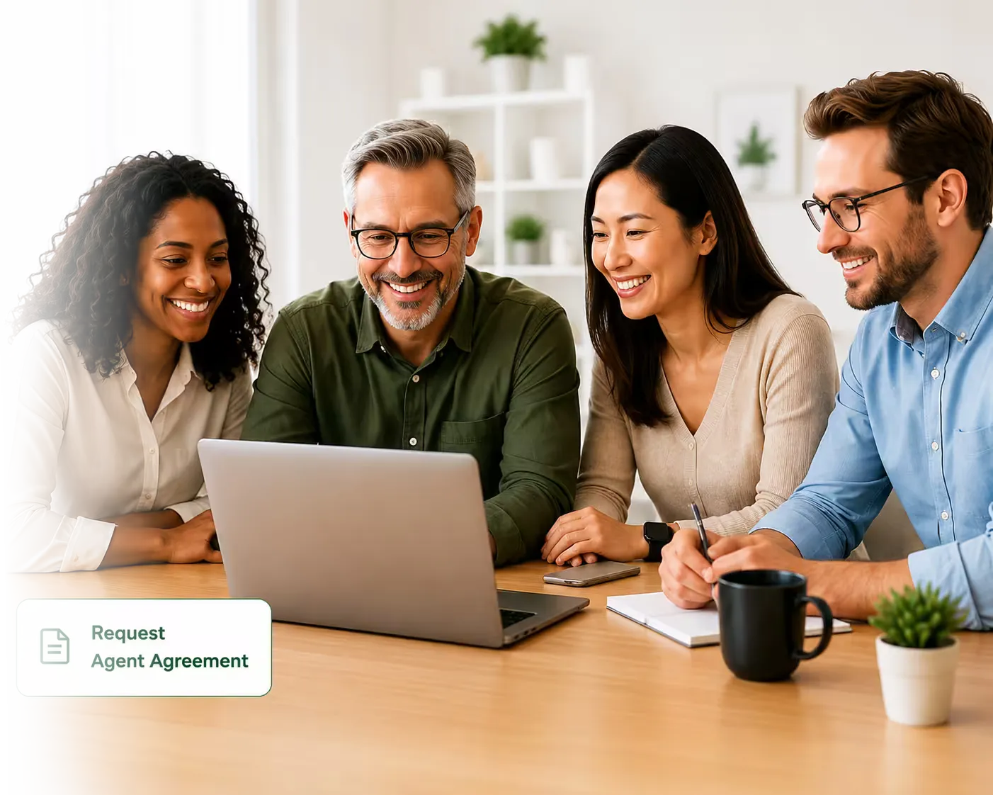 Ontario agents reviewing their options together at a laptop
